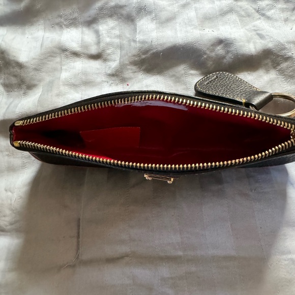 Dooney&Burke Small black leather wristlet with a Tan trim - Picture 2 of 5